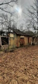Нежилое здание площадью 63,8 кв. м, расположенное на земельном участке площадью 1266 кв. м в Зеленогорске на улице Мира.